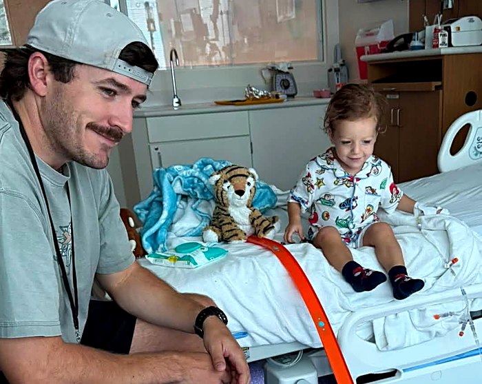 Carter and his dad in his hospital room