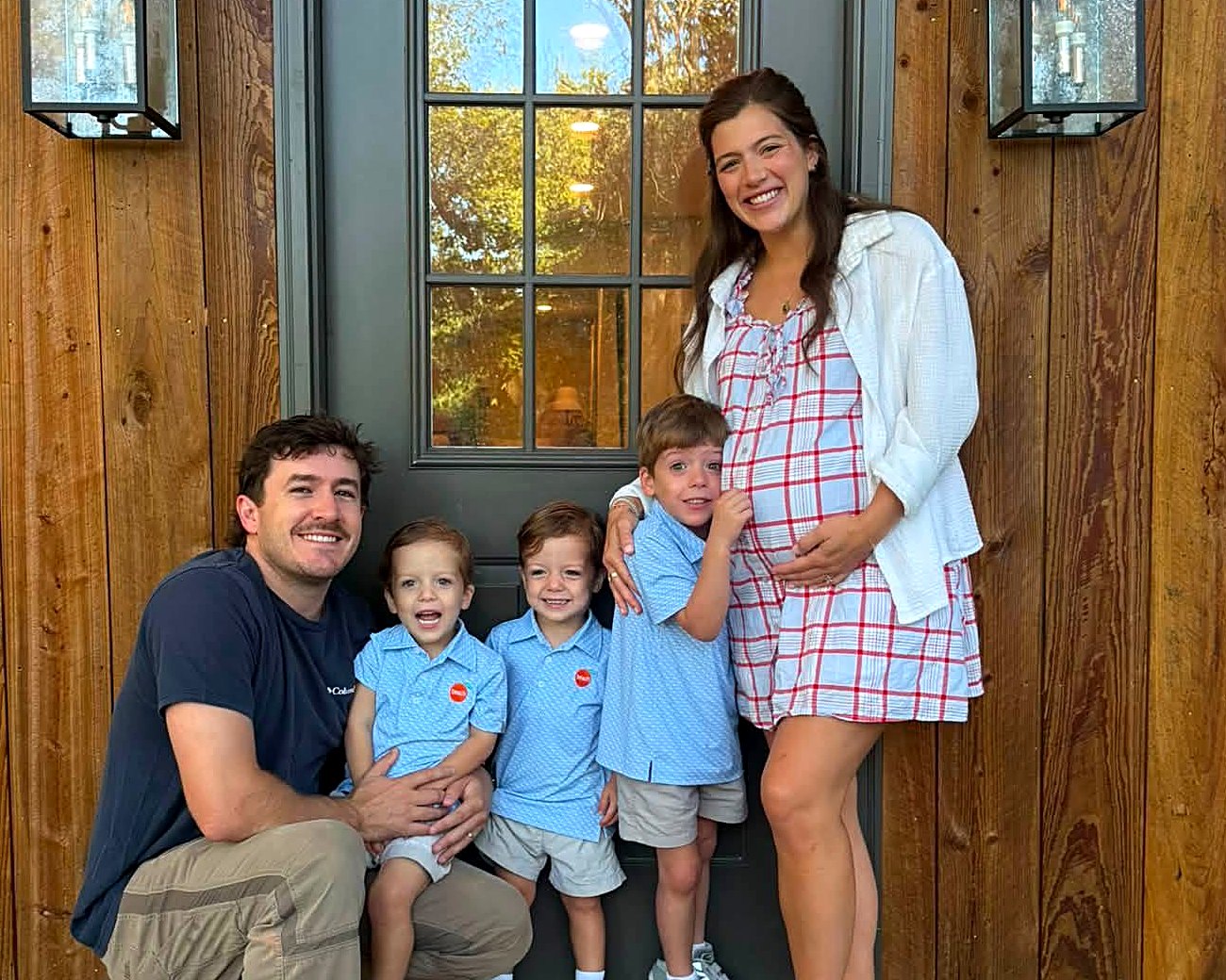 Carter's family together at the front door